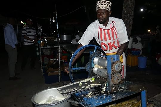 Fresh sugar cane juice at Forodhani Garden in Stone Town, Zanzibar, Tanzania.