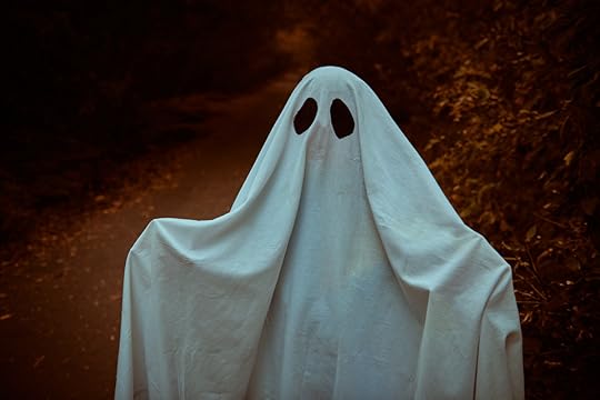 Child in ghost costume
