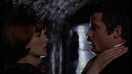 Glenda Jackson puts her hands around Oliver Reed's throat in