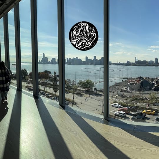 A visitor approaches, coming across the Hudson River toward the Whitney Museum in NYC