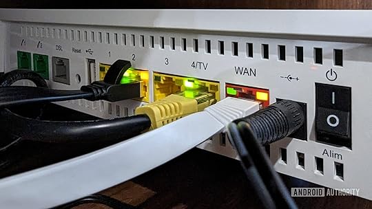 Router ports with Ethernet cables plugged in