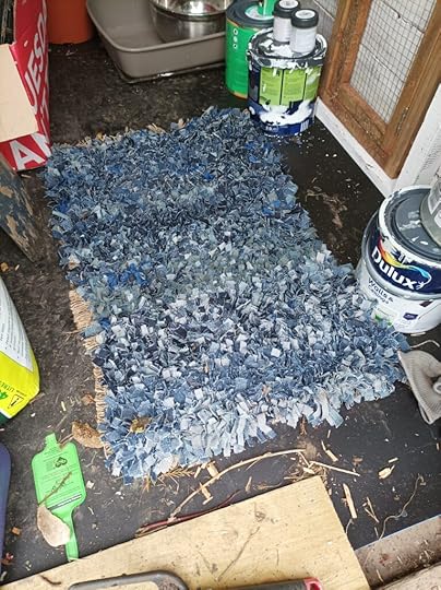 A finished rug made from upcycled jeans