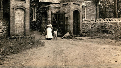 Eliza Coleman (1845-1932) and a child at the old Monticello Gate House