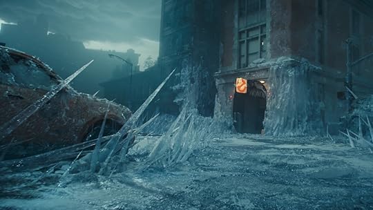 The Ghostbusters firehouse with lit up logo sign covered in ice same as the street and cars out front from Ghostbusters: Frozen Empire