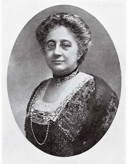 a head and shoulders portrait of a woman