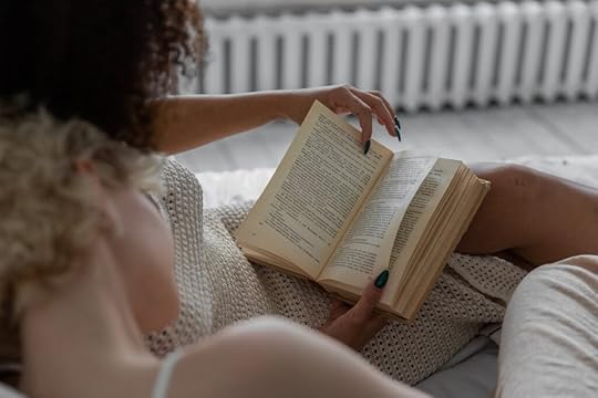 A woman reading a book.