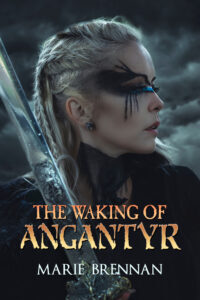 cover art for THE WAKING OF ANGANTYR by Marie Brennan, showing a white woman with braided blonde hair and wing-like black paint around her eyes, holding a sword and looking to her left