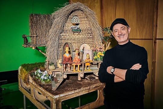 Chicken Run: Dawn of the Nugget director Sam Fell with his Chicken puppets from the film.