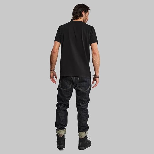 man in vollebak wooden t-shirt facing backward