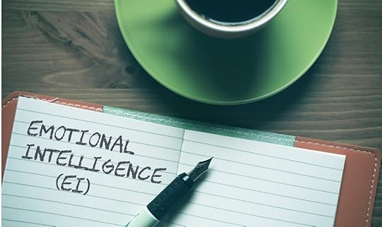 emotional intelligence with pen and coffee cup