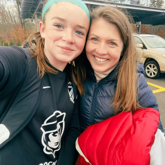 photo of Marilee and Amy Julia smiling for a selfie outside ready for a soccer game
