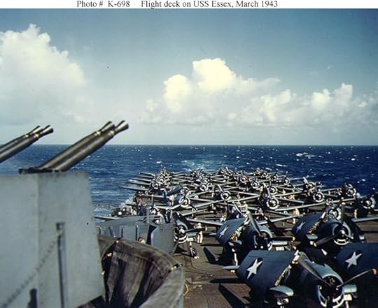 F6F Hellcat (foreground) and SBD Dauntless aircraft on deck of carrier USS Essex, 20 March 1943 (US National Archives: 80-G-K-698)