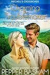 Charming the Troublemaker (Mitchell's Crossroads, #2)