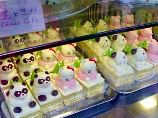 cakes in a shop window Chinatown, London.