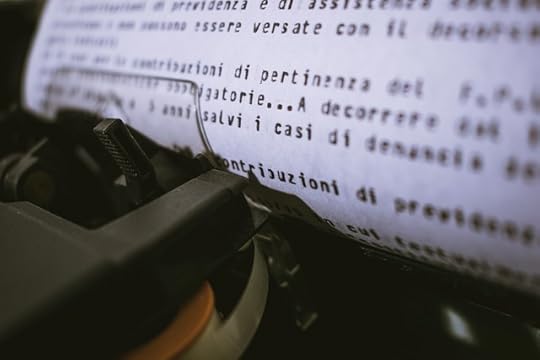 electronic typewriter with a page of typed material in Italian.