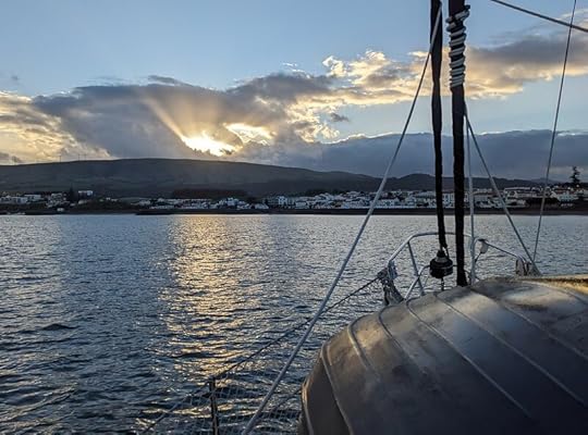 Our tender, Tursiops, with fresh bottom paint under a Terceira sunset