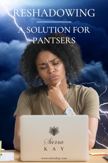 Woman thinking at a laptop.
