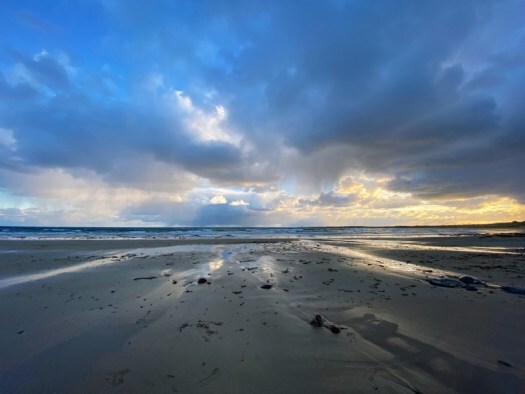 dramatic skies over the beach: ghostberries and serenity