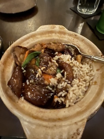 Eggplant and other veggies in lots of spices with rice. What a meal! Had me sweating it was so good and hot.