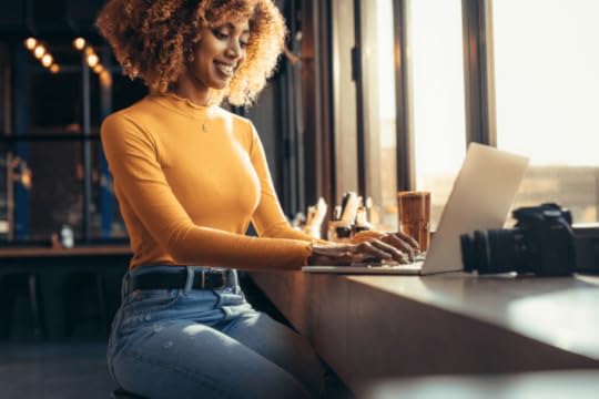 An attractive lady working on her laptop researching is freelancing a good career option.