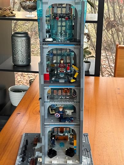 The front of Avengers Tower open showing scenes made with LEGO Marvel minifigs