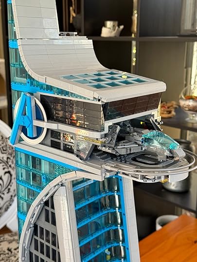 The top of Avengers Tower with a small Quinjet poking out of a launchpad