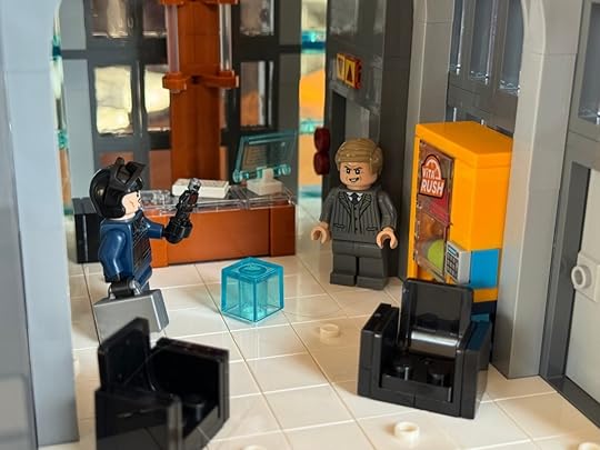 LEGO minifigs in a scene at the bottom of Avengers Tower