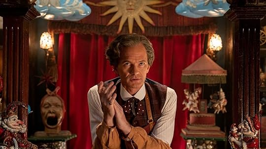 The Toymaker sits in his shop in doctor who anniversary special the giggle