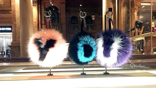 personal brand represented as fuzzy keychain spelling you