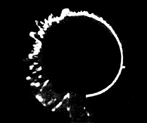 The effect of “Window” on the display of a German Giant Würzburg (Würzburg-Riese) radar: the right half shows a normal display with a target blip in the 3 o’clock position; the left half shows the effect of jamming by “Window,” making target blips indistinguishable. (United Kingdom government photo, public domain)