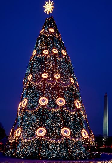 Photo shows the National Christmas Tree on the Ellipse of the White House, with the Washington Monument in the background.
