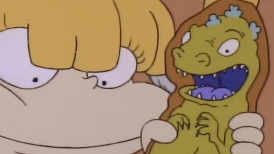 Angelica holding an unopened Reptar bar on Rugrats
