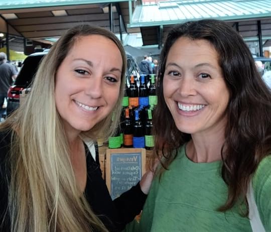 Two smiling women looking at the camera