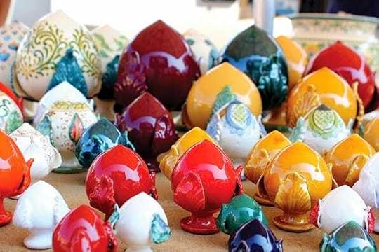 A group of colorful ceramic objectsDescription automatically generated