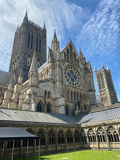 Image shows Lincoln Cathedral from the cloisters