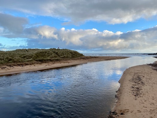 The River Ugie flowing into the North Sea
