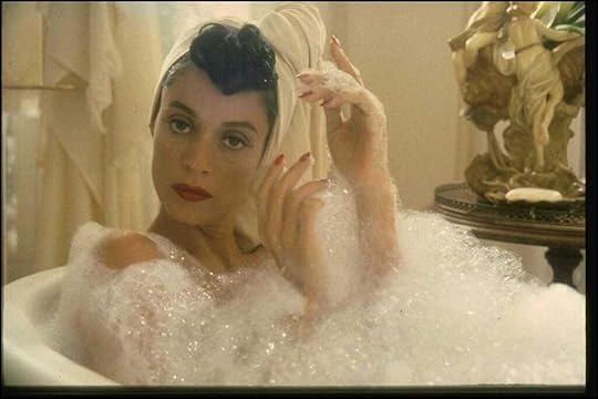 Sonia Braga in a bathtub in