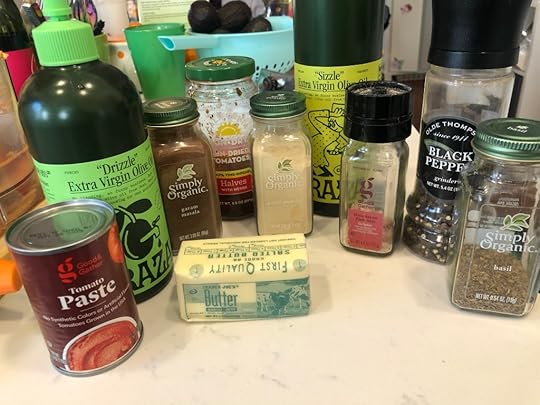 photo of the following ingredients:one stick salted butterone small can tomoato paste