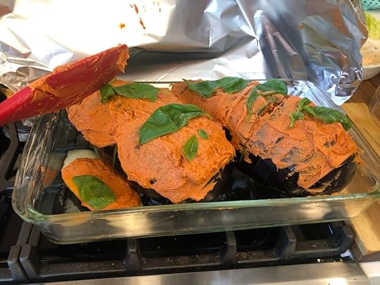 The eggplants in the glass pan again, all ready to be covered in foil and put into the hot oven