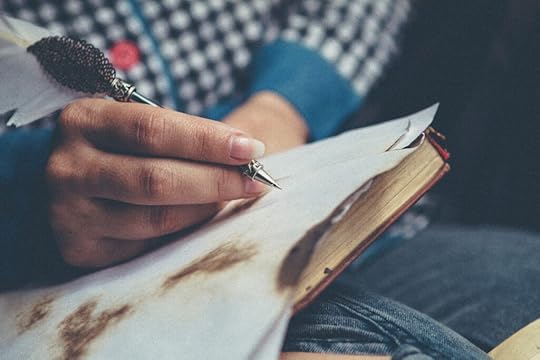 A person writing.