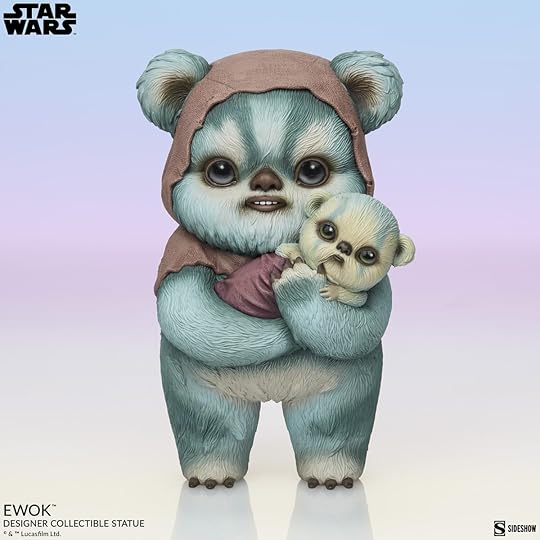 Front of Ewok holding a baby statue
