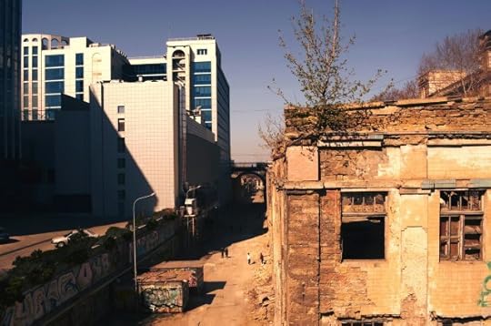 old building and modern construction side by side. proof it hasn't always been this way