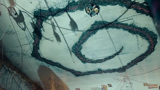 A swirling symbol in black on the roof of a trailer from True Detective: Night Country