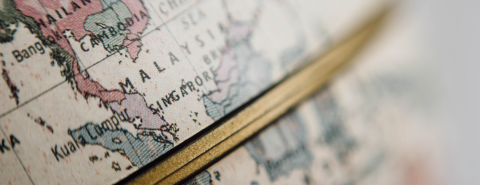 Close up of Southeast Asia on a globe, particularly Malaysia, Singapore, and Indonesia