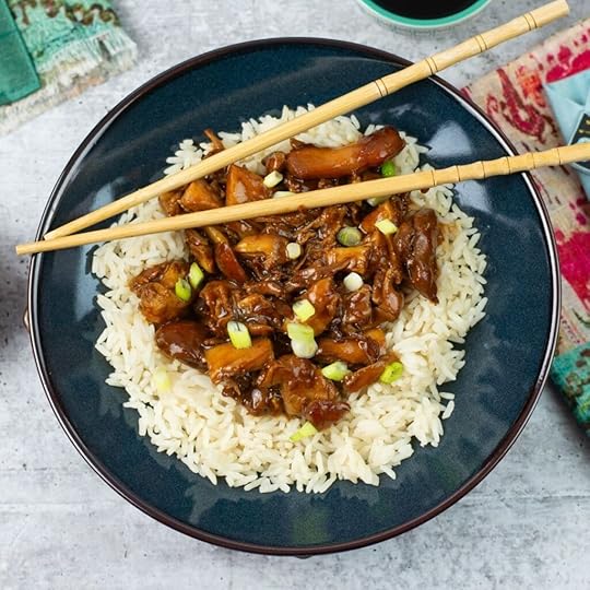 Hoisin Chicken served over rice in a bowl.