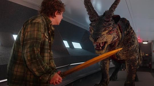 Percy Jackson holds Riptide the sword up to fight the Chimera on the Gateway Arch