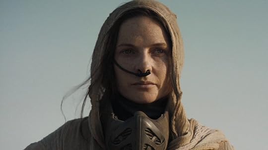 Rebecca Ferguson's Lady Jessica dressed like a Fremen in a hood and stillsuit in Dune