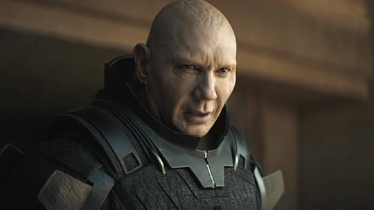 Dave Bautista as the bald, pale Glossu Rabban Harkonnen in his armor in Dune