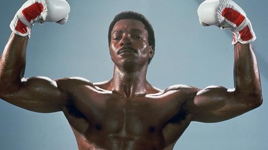 Apollo Creed flexing in Rocky IV, played by Carl Weathers, who has passed away at age 76