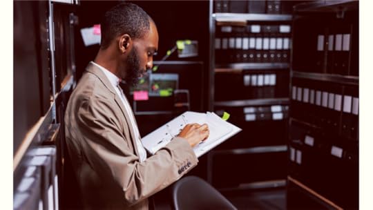 HR Law investigator reviewing documents in the workplace